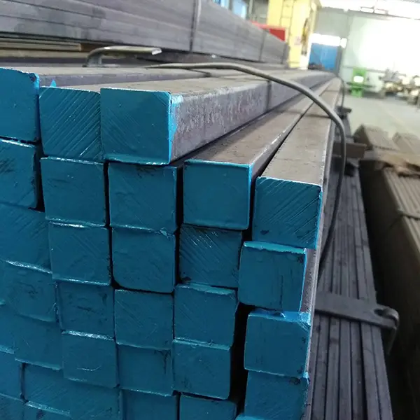 Close-up of hot rolled steel square bar with rough finish and solid edges