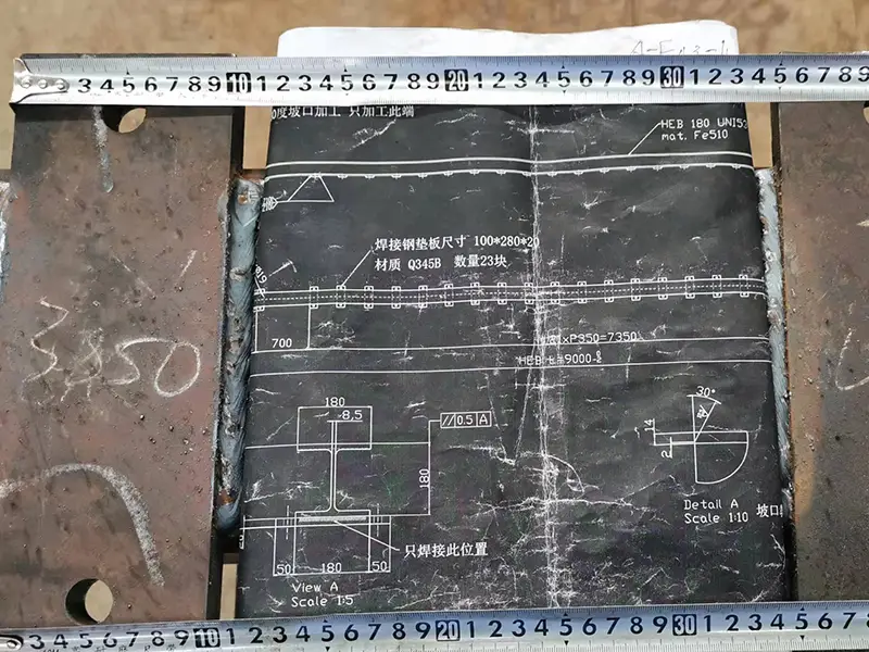 Machining steel plate with technical drawing